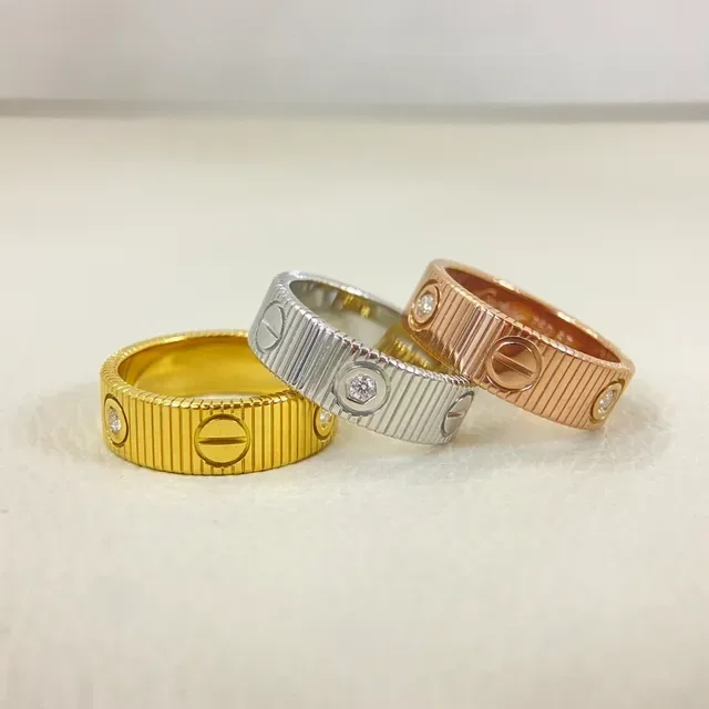 Cartier Juste un Clou Bague or et argent avec bande cannelée motif tête de vis 2