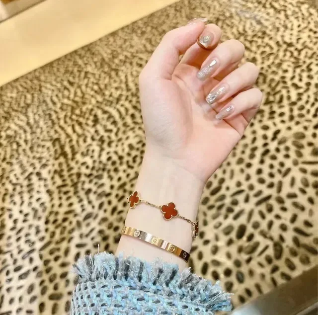 سوارة Cartier Love مصقولة فضة وذهبي مفصلية بموتيف براغي سوارات 9