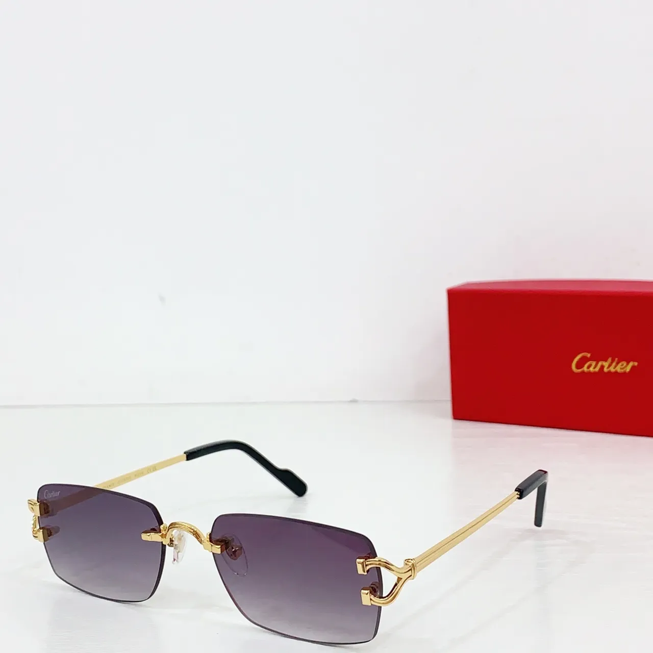 Cartier Lunettes de Soleil Sans Monture Ton Or Dégradé Gris 2