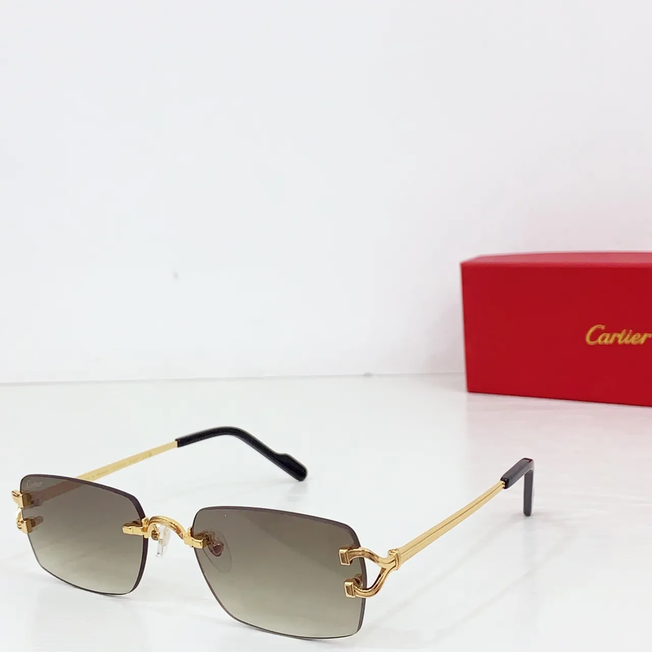 Cartier Lunettes de Soleil Sans Monture Ton Or Dégradé Gris 4
