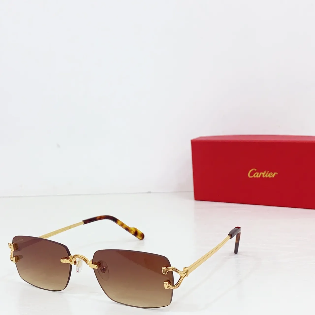 Cartier Lunettes de Soleil Sans Monture Ton Or Dégradé Gris 7