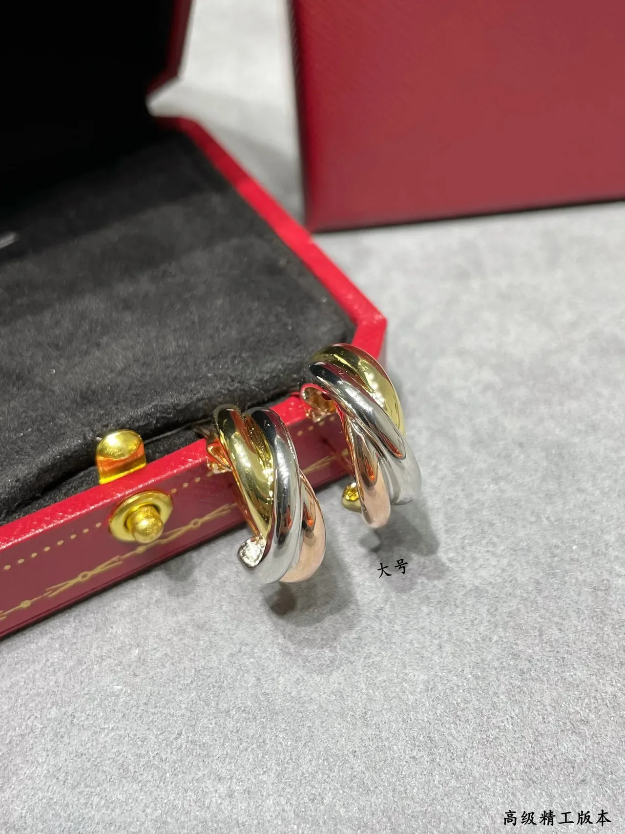 Boucles d'oreilles Cartier Trinity Triple-Band Twisted Hoop 3