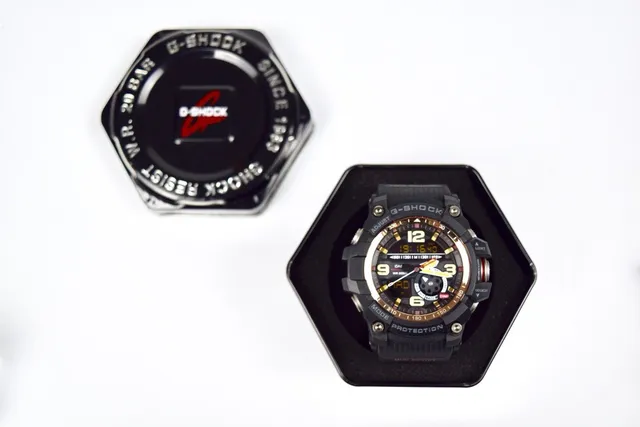Casio G-Shock GA-100 Black and Gold Sports Watch 4