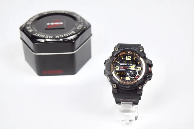 Casio G-Shock GA-100 Black and Gold Sports Watch 5