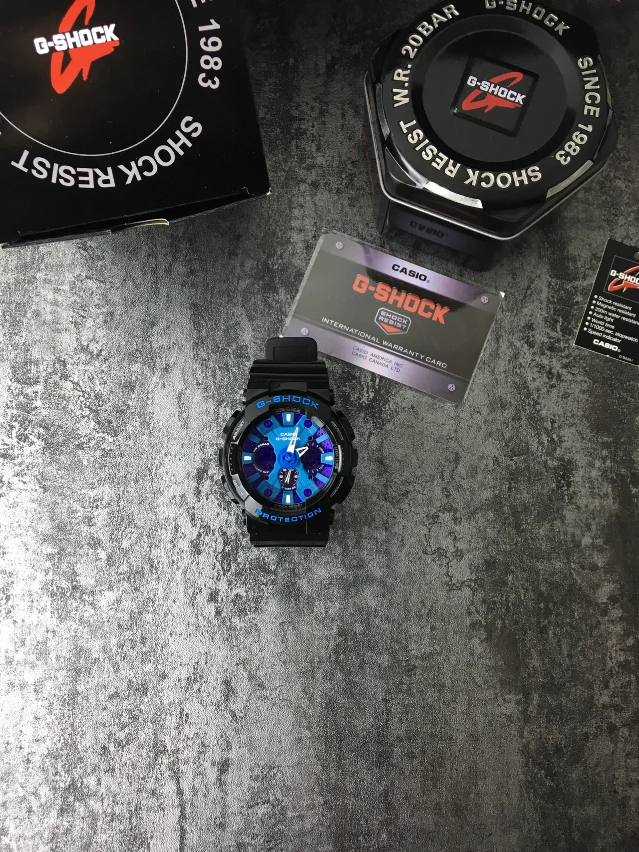 Casio G-Shock GA-100 ساعة رياضية بقرص أزرق وأرجواني متعدد الطبقات 2