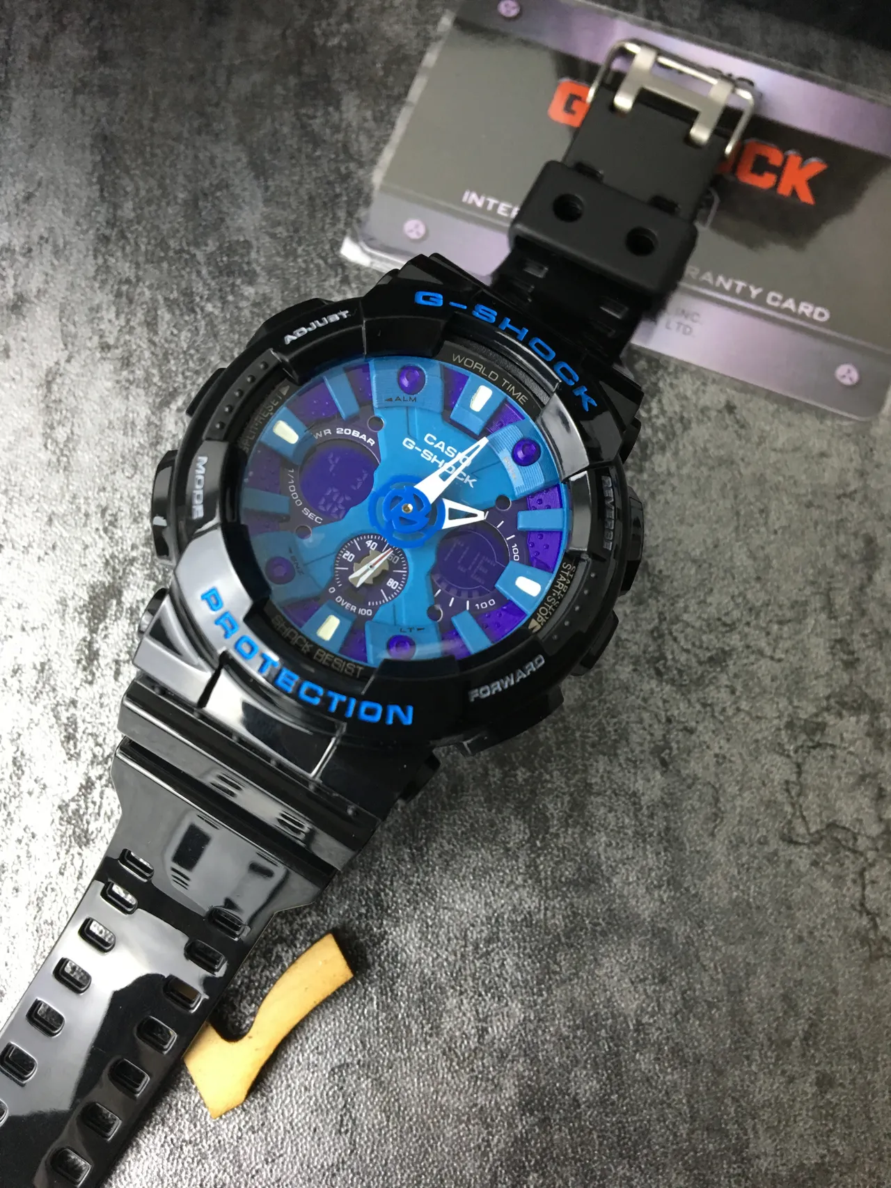 Casio G-Shock GA-100 ساعة رياضية بقرص أزرق وأرجواني متعدد الطبقات 5