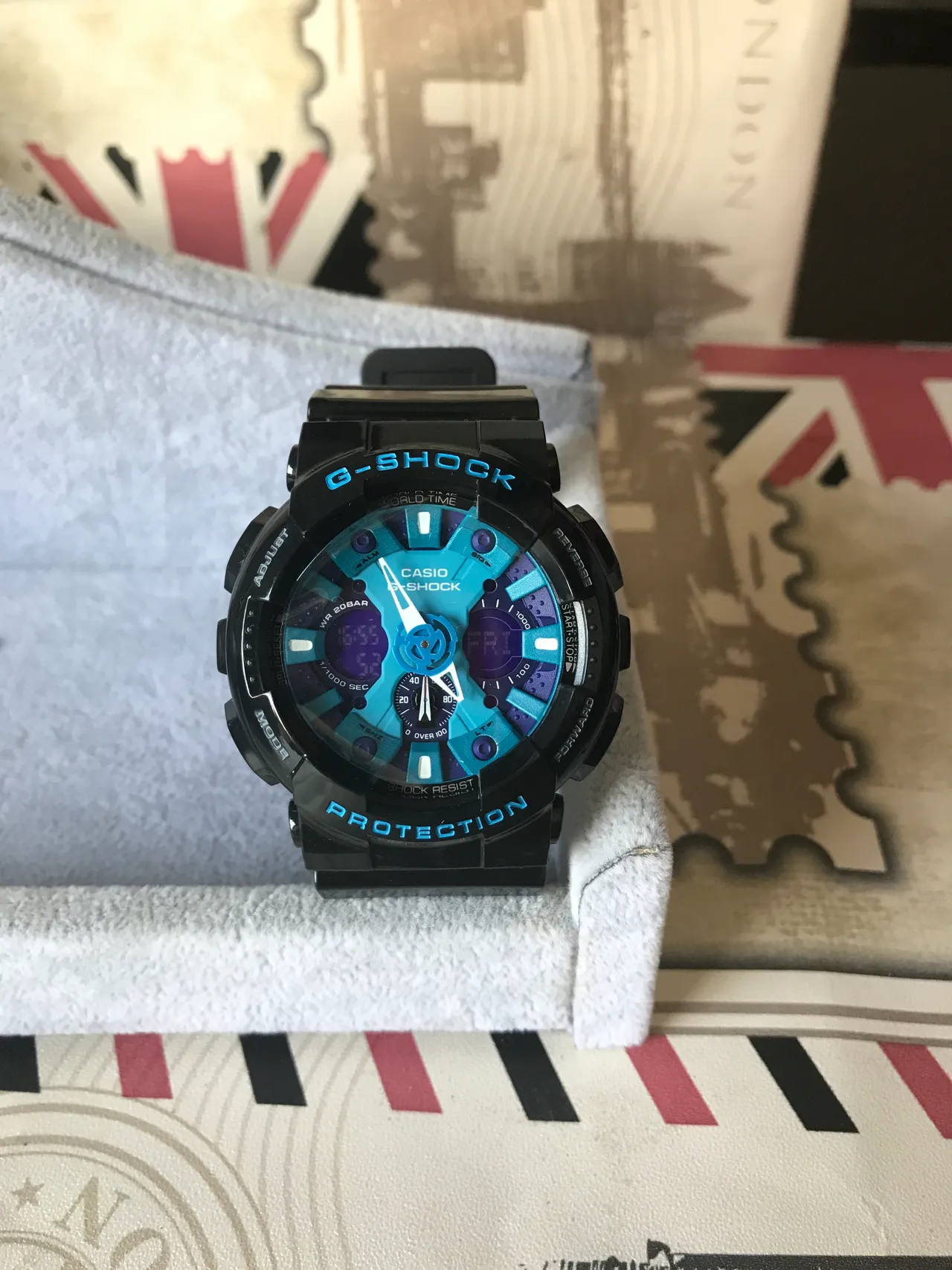 Casio G-Shock GA-100 ساعة رياضية بقرص أزرق وأرجواني متعدد الطبقات 10