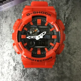 Casio G-Shock GA-100 ساعة رياضية برتقالية من الراتنج