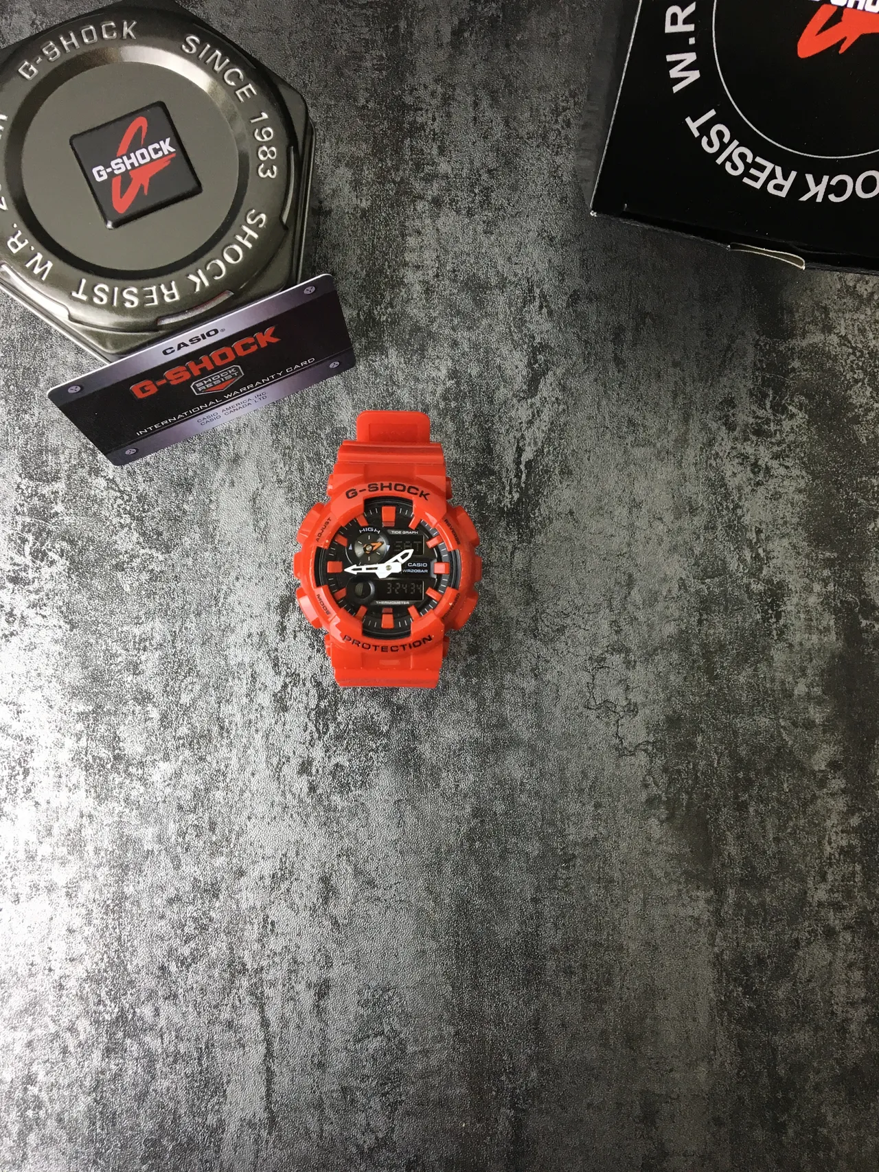 Casio G-Shock GA-100 ساعة رياضية برتقالية من الراتنج 2