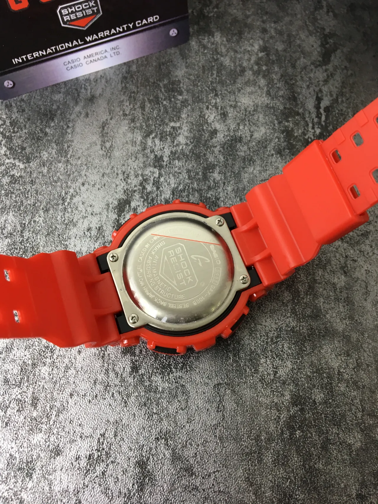 Casio G-Shock GA-100 ساعة رياضية برتقالية من الراتنج 3