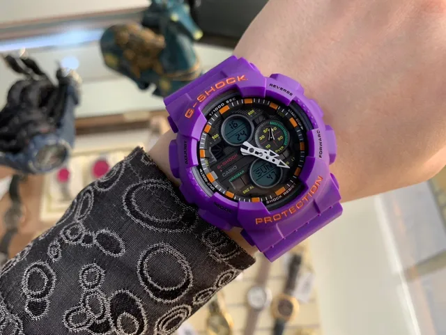 Casio G-Shock GA-100 Purple and Orange Sports Watch 2