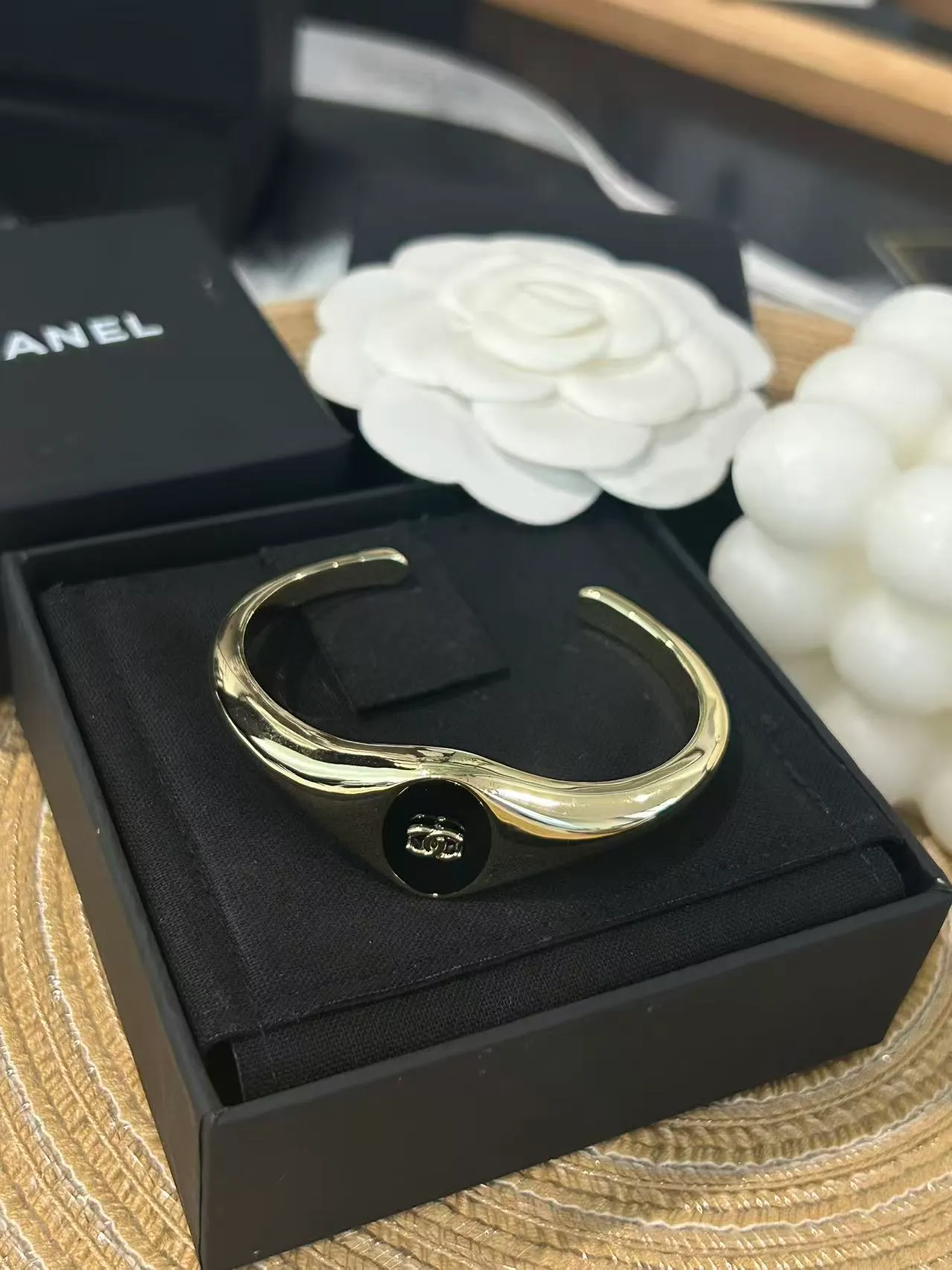 Chanel Gold Burgundy Asymmetrical Open Cuff Polished Metal Bracelet 7