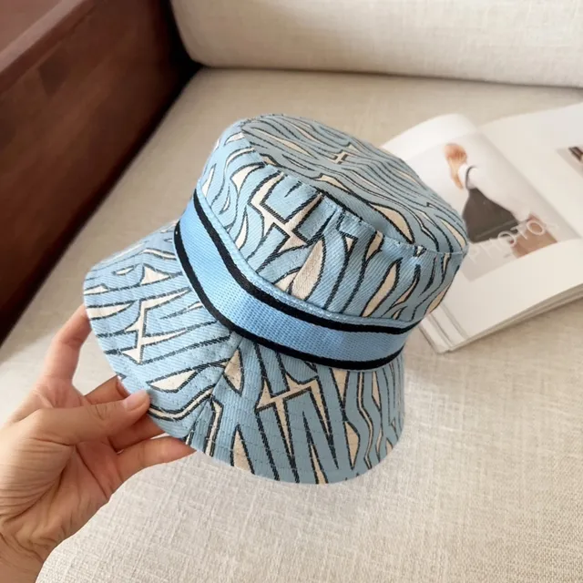Chapeau bucket à bord plat imprimé géométrique abstrait bleu beige 9