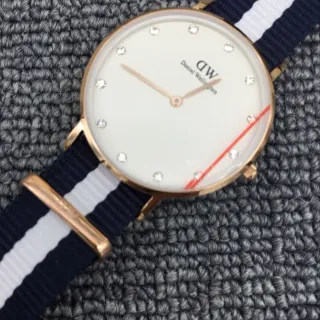 Daniel Wellington Classic Petite Red Dial Rose Gold Case Navy White Strap Quartz Watch