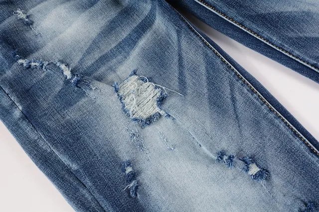 Distressed Slim-Fit Mid-Rise Blue Jeans 11