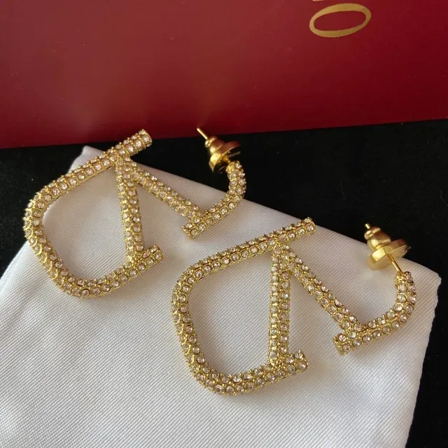 Gold and Silver Crystal-Encrusted Geometric Letter Stud Earrings 4
