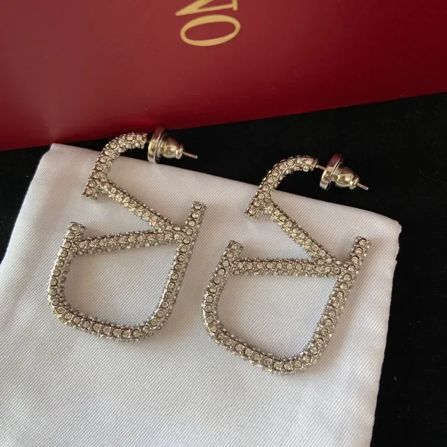 Gold and Silver Crystal-Encrusted Geometric Letter Stud Earrings 6