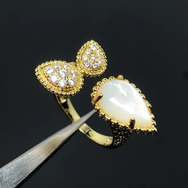 Gold Multicolor Teardrop Cabochon Center Stone Pavé-Set Leaf-Shaped Side Motifs Ring 4