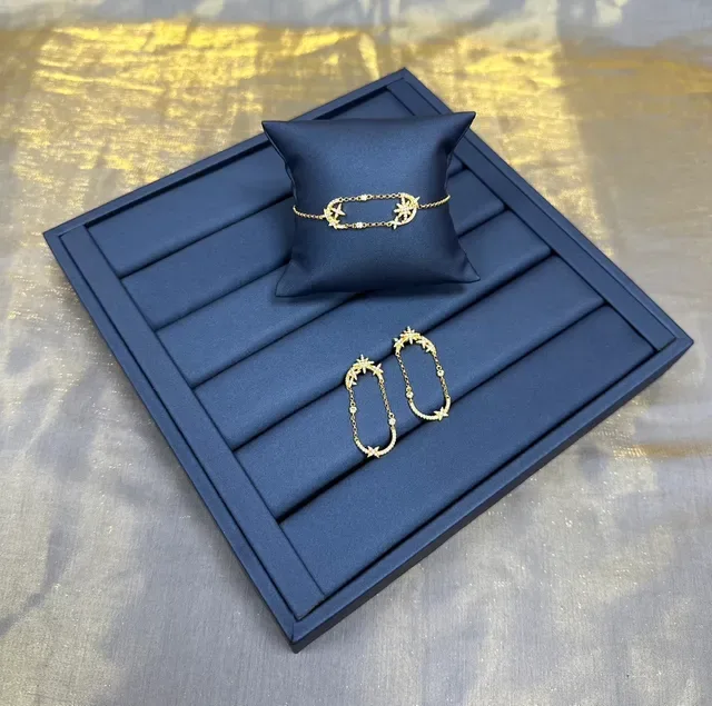 Gold-Tone Star and Compass Rose Charm Bracelet 9