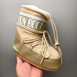 Moon Boot ক্লাসিক মেটালিক গোল্ড শিয়ারলিং-লাইন্ড স্নো বুট
