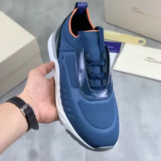 Santoni حذاء رياضي أسلوب حياة بحزام ملون أزرق بحري برتقالي أعلى محبوك مع كاونتر كعب مقسى لامع