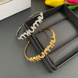 Pulseras Abiertas de Plata y Dorado en Tonos con Letra Pavé