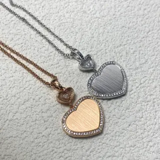 Collier pendentif argent et or en forme de cœur à double couche avec bordure de pierres pavé