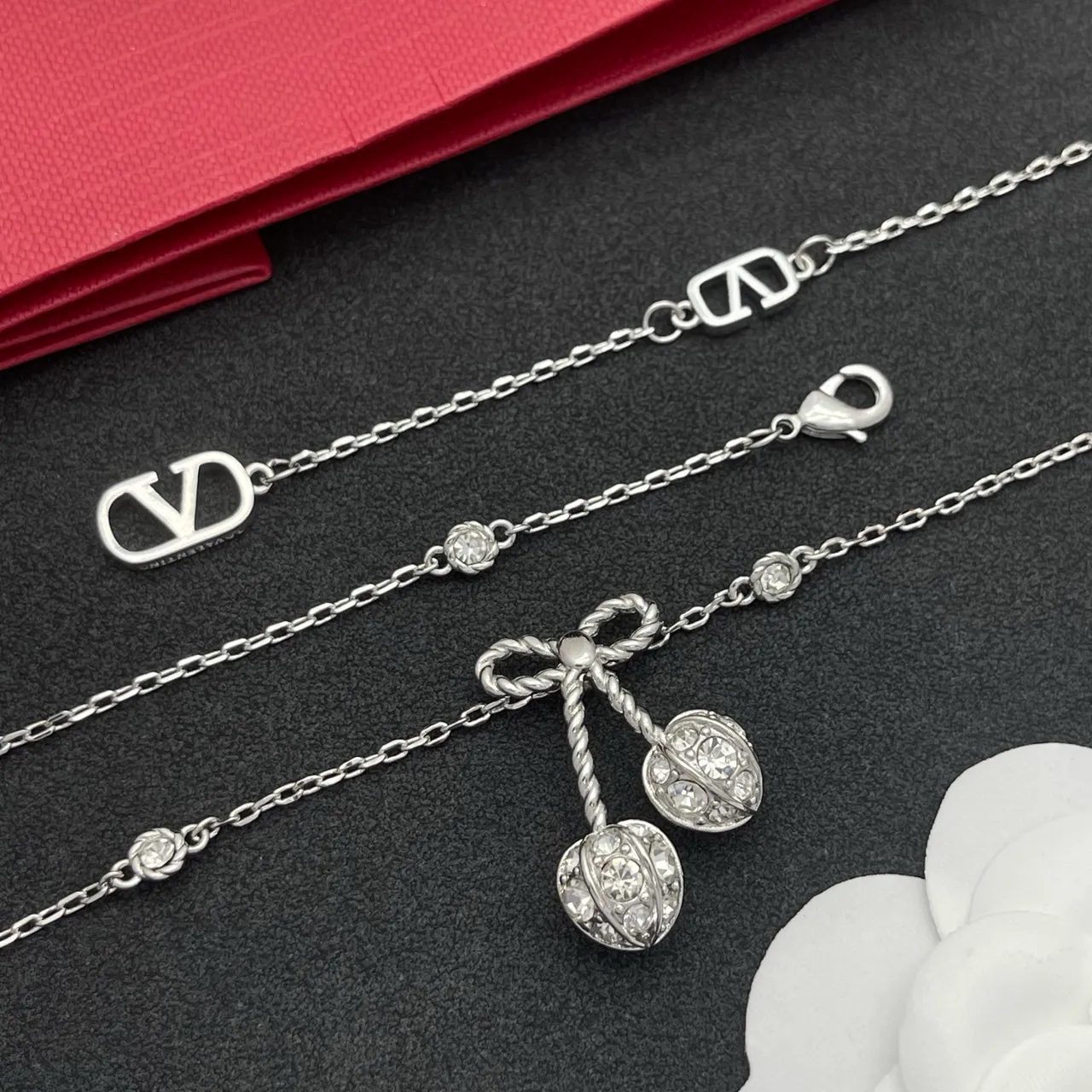 Silver-Tone Bow and Cherry Pendant Necklace 4