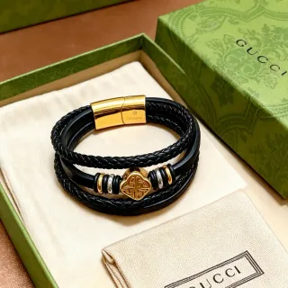 Gucci Pulsera de cuero trenzada negro y oro multi-enrollado