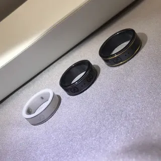 Gucci Black Gold Rotating Band Interlocking GG Logo Ring