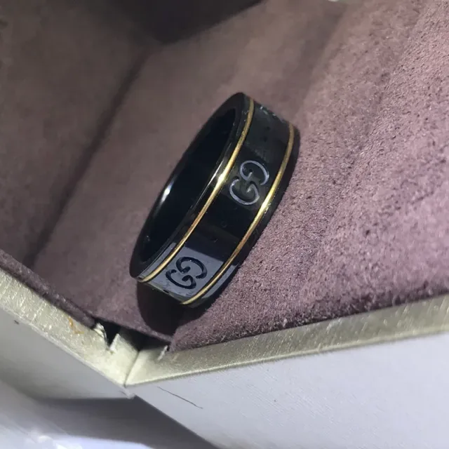 Gucci Black Gold Rotating Band Interlocking GG Logo Ring 7