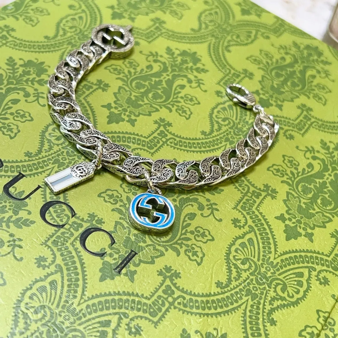 Gucci Iconic Silver Blue Ornate Engraved Curb-Link Chain Dual Enamel Charms Bracelet 7
