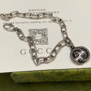 Gucci Interlocking G Pulsera de eslabones retorcidos plateada