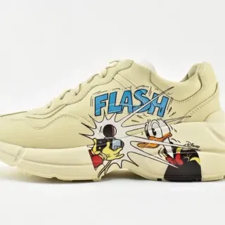 Gucci Rhyton Disney تعاون كريمي حذاء رياضي سميك