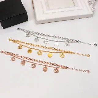 Gucci Plata y Oro Cadena con Enlaces Colgantes Encantos Pulsera