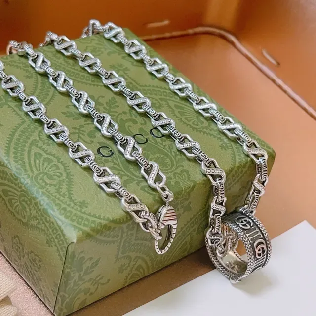 Gucci Silver Twisted Rope-Link Chain Cylindrical Engraved Pendant Necklace 9