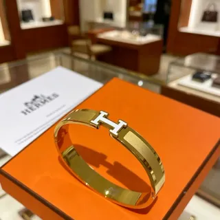 Hermès Clic H Gold White Rigid Bangle Enamel-Accented Clasp Bracelet