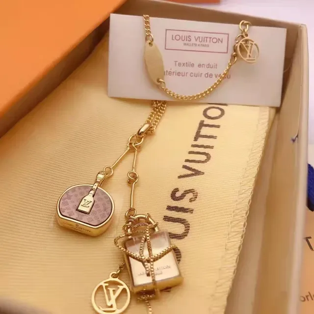Louis Vuitton Asymmetrical Lock and Chain LV Monogram Earrings 3