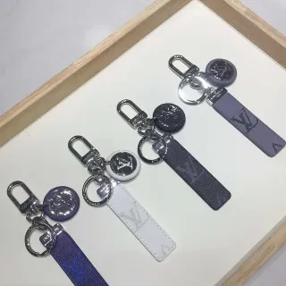 Louis Vuitton Blue White Monogrammed Leather Strap Circular Metallic Logo Charm Phone Case
