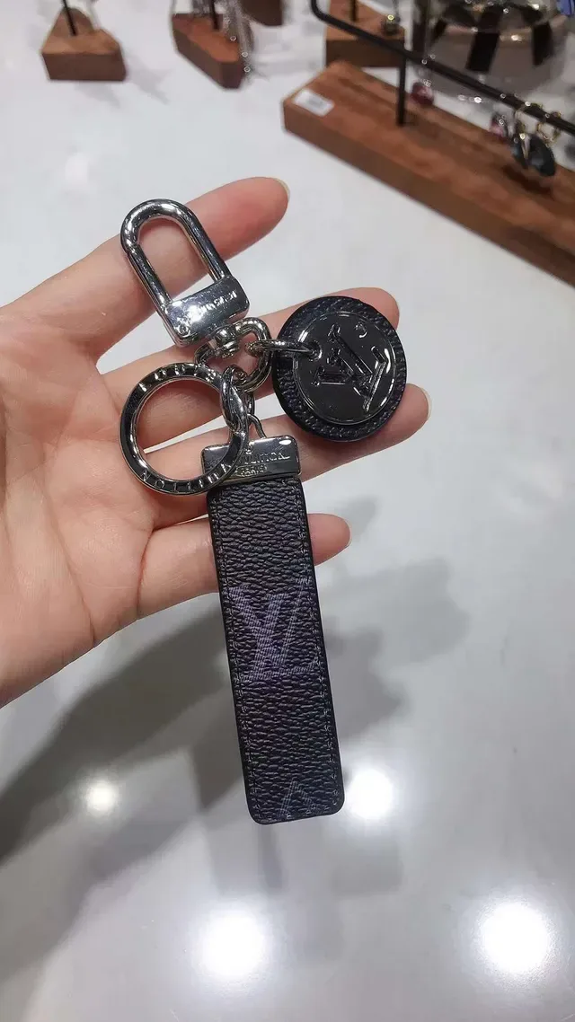 Louis Vuitton Blue White Monogrammed Leather Strap Circular Metallic Logo Charm Phone Case 2