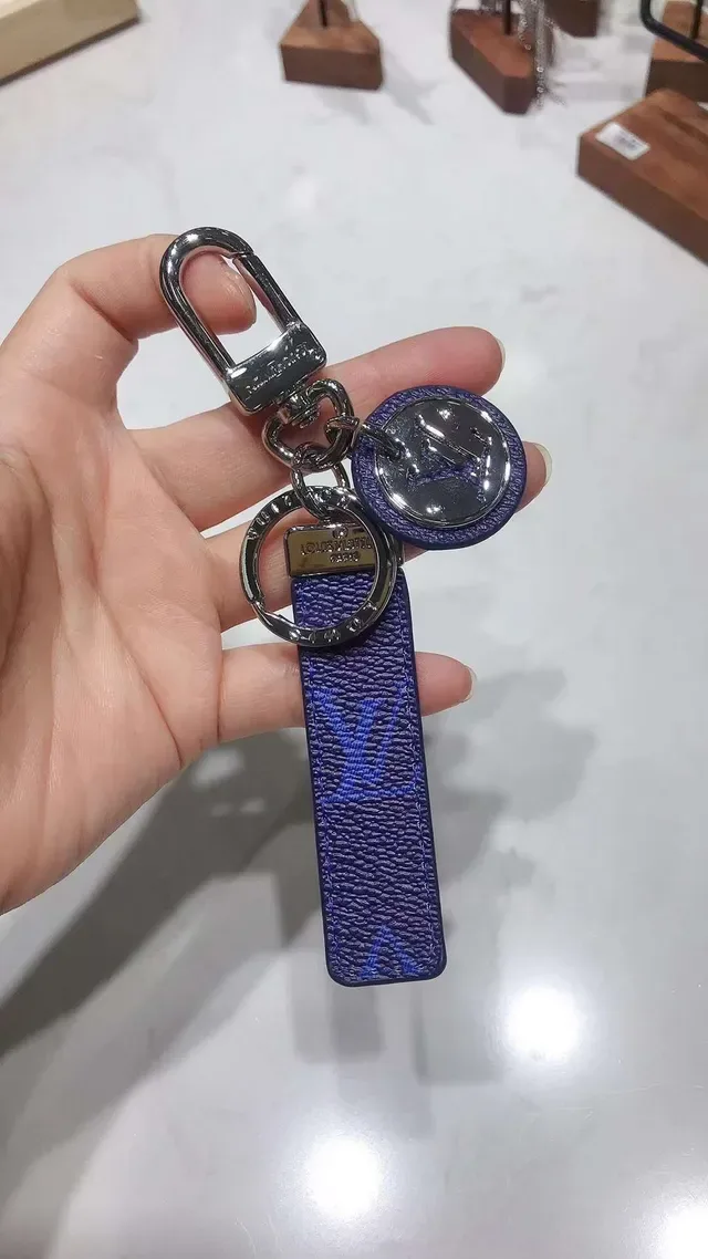 Louis Vuitton Blue White Monogrammed Leather Strap Circular Metallic Logo Charm Phone Case 4