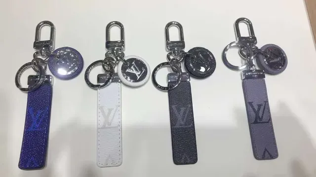 Louis Vuitton Blue White Monogrammed Leather Strap Circular Metallic Logo Charm Phone Case 6