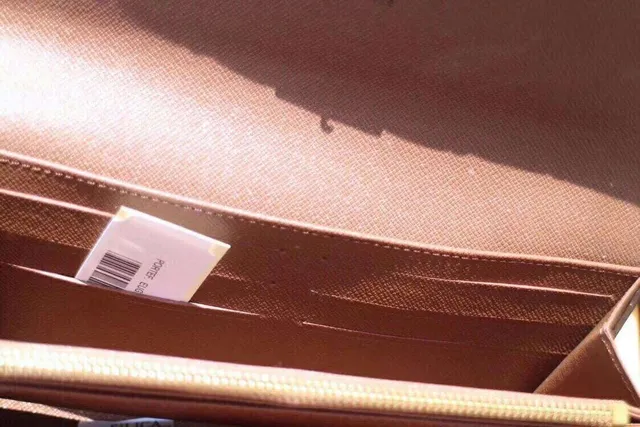 Louis Vuitton Brown Beige Monogram Coated Canvas Dark Leather Trim Long Wallet 20