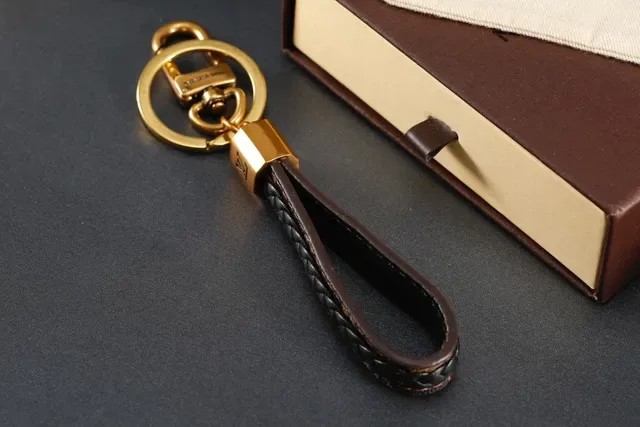 Louis Vuitton বাদামী সোনালি বোনা চামড়ার হার্ডওয়্যার রিস্টলেট 2