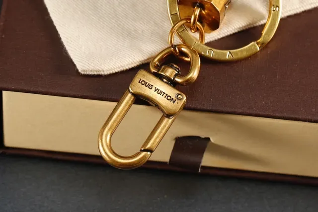Louis Vuitton বাদামী সোনালি বোনা চামড়ার হার্ডওয়্যার রিস্টলেট 5