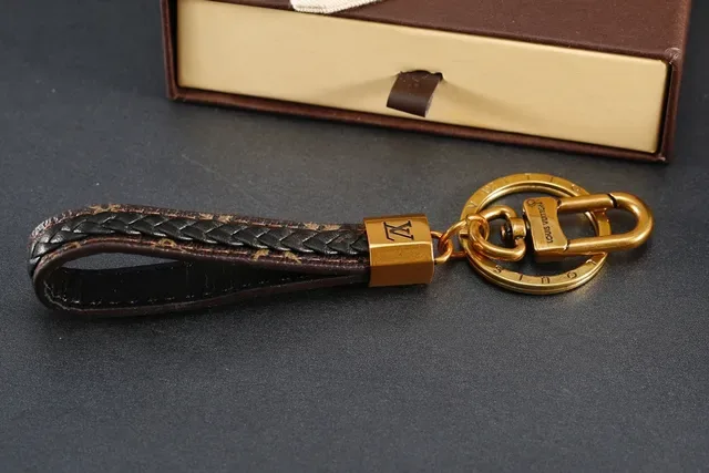Louis Vuitton বাদামী সোনালি বোনা চামড়ার হার্ডওয়্যার রিস্টলেট 7