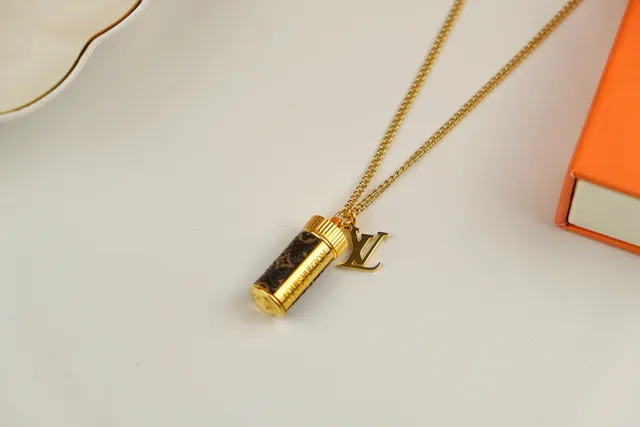 Louis Vuitton Brown Gold Cylindrical Monogram Pendant Chain Necklace 7