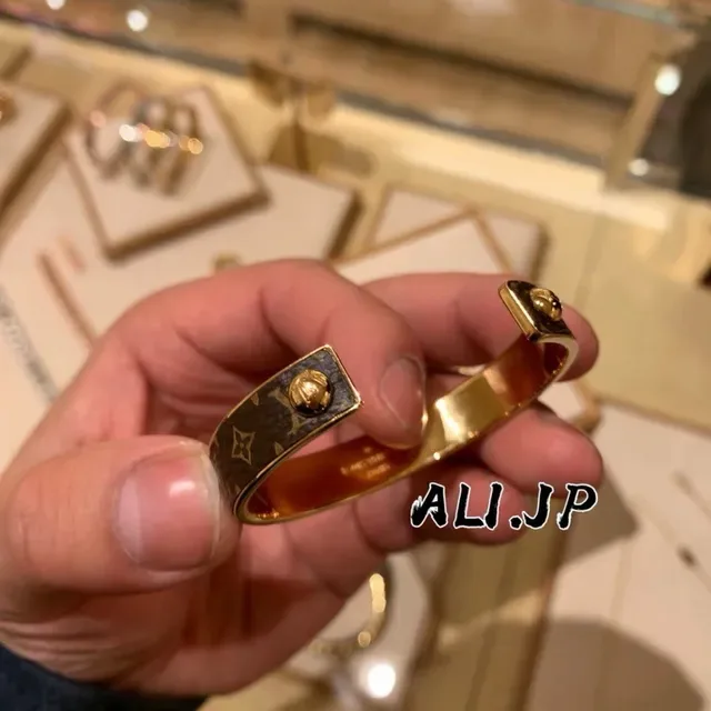 Louis Vuitton Brown Red Monogram Leather-Wrapped Gold-Tone Metal Cuff Bracelet 5