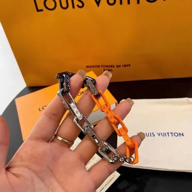 Louis Vuitton Chain Reaction Mixed-Material Orange and Silver Bracelet 2