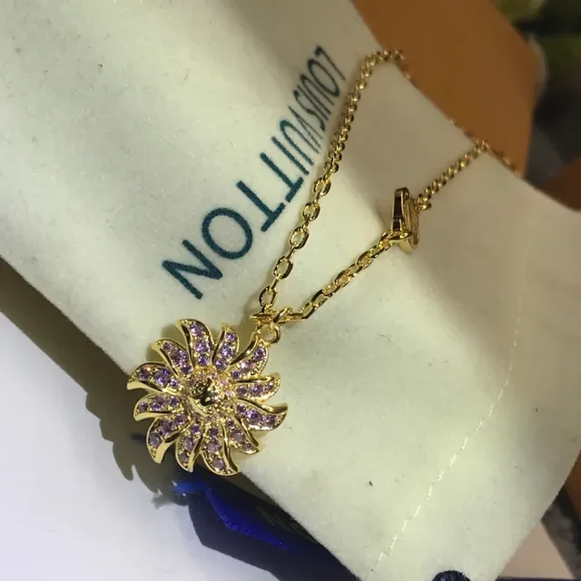 Louis Vuitton Floral Sunburst Pavé Crystal Pendant Necklaces 3